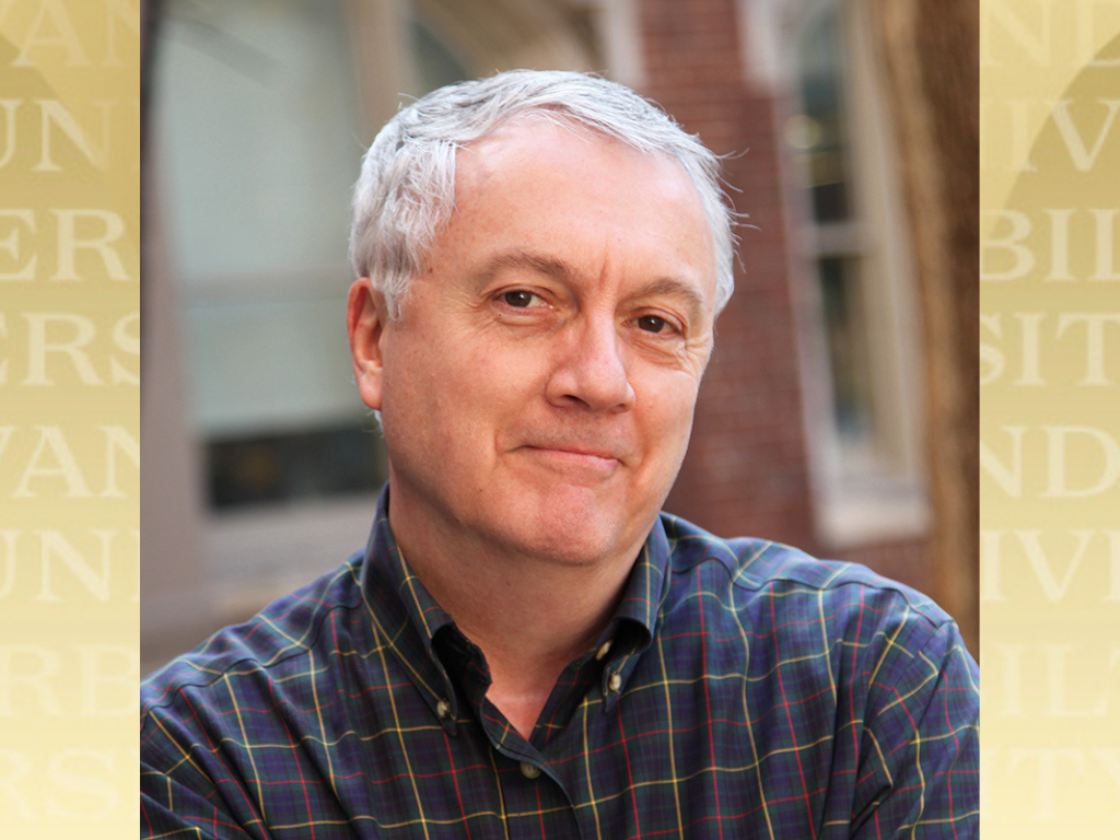 Stephen Doster headshot over Vanderbilt gold background