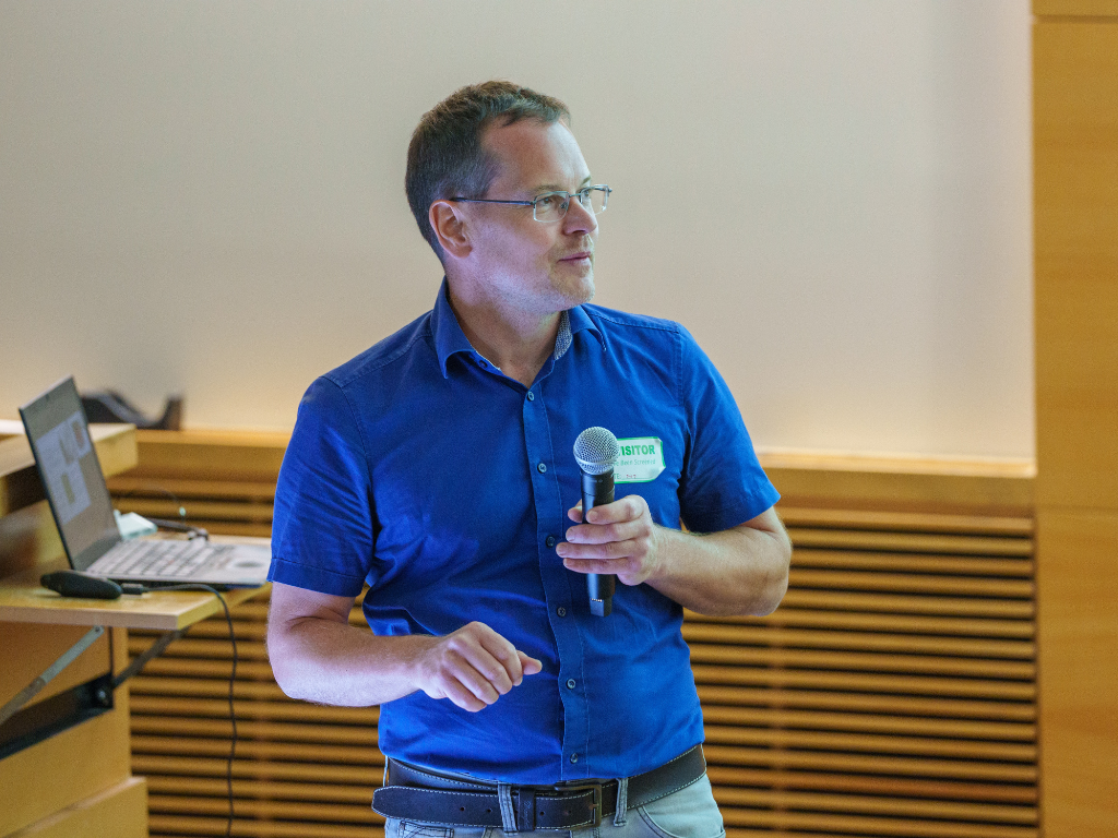 Christian Mayr speaking at a seminar sponsored by the Center for Applied AI in Protein Dynamics