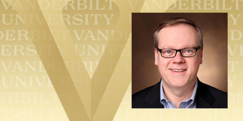 Headshot of Bill Tansey overlaid over a gold background with the Vanderbilt V on the left and 