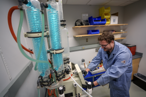 Photo of lab technician in Synthesis Core. Photo: Harrison McClary/Vanderbilt University