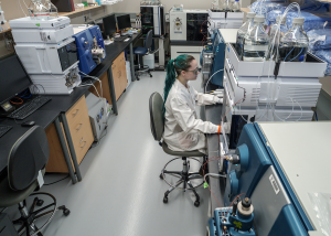 Photo of lab technician at work. Photo: Harrison McClary/Vanderbilt University