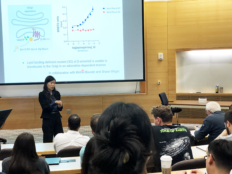 Photo of Jin Zhang (left) fielding question from her audience.