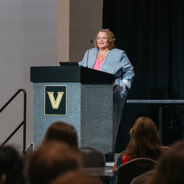 Renee Iacona standing at a podium