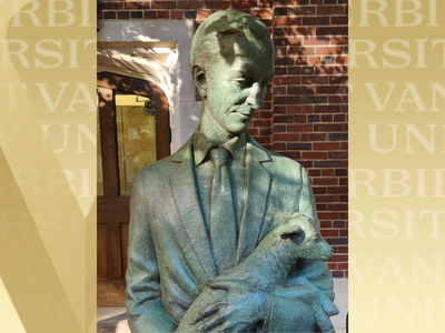 Bronze statue of Virgil LeQuire lovingly holding a baby goat in his arms. The image is flanked by a background of gold and the Vanderbilt name.