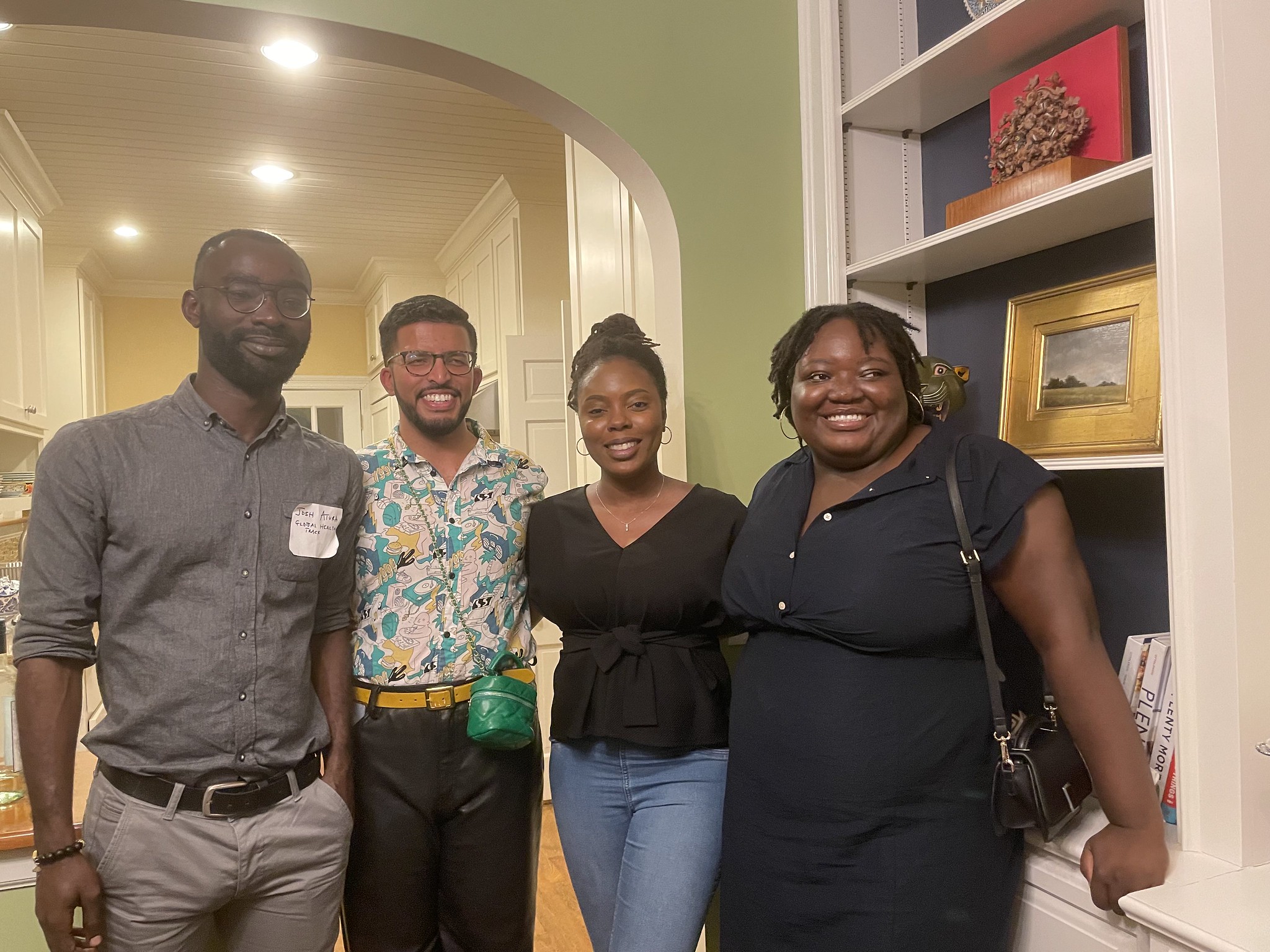 Four students pose together