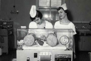 3921_nurses_caring_for_a_premature_infant_pgh_c1950.rev.1482335671