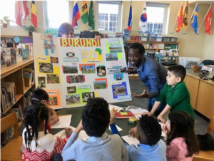 Gerard Ntiranyuhura (Burundi, 18-19) sharing with students about the vast variety of landscape in Burundi