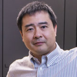 Teru Nakagawa in the Cryo-EM Lab