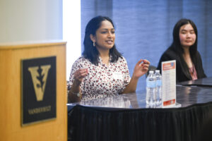 This photo features two student presenters from the 2023 Undergraduate Writing Symposium