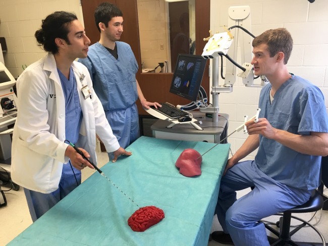 From left, Hernan Gonzalez, Jon Heiselman and Patrick Anderson. Not pictured, Megan Poorman. (Heidi Hall/Vanderbilt University)