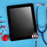 iPad with stethoscope on blue background