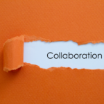 Orange paper with the word collaboration