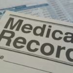 A picture of a manilla folder with the words "medical record" written on it