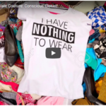 On a pile of colorful clothes in disarray, a white t-shirt with black text reads "I HAVE NOTHING TO WEAR."