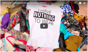 On a pile of colorful clothes in disarray, a white t-shirt with black text reads "I HAVE NOTHING TO WEAR."