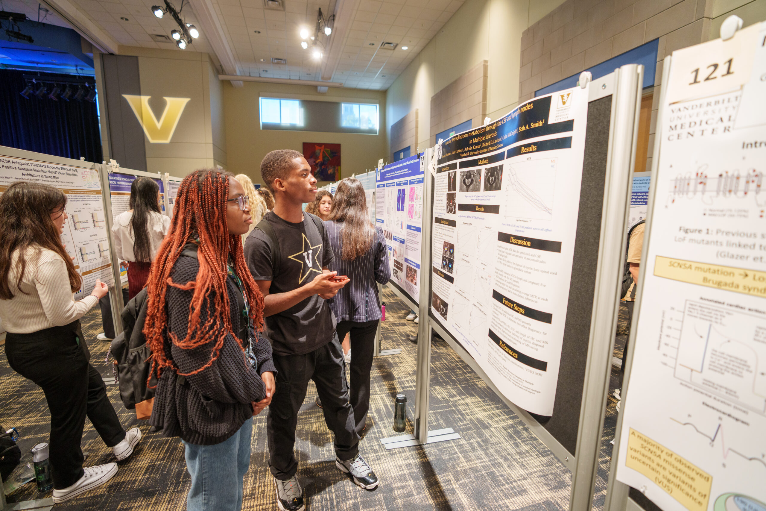 Students showcasing their research during the Fall Undergraduate Research Fair.