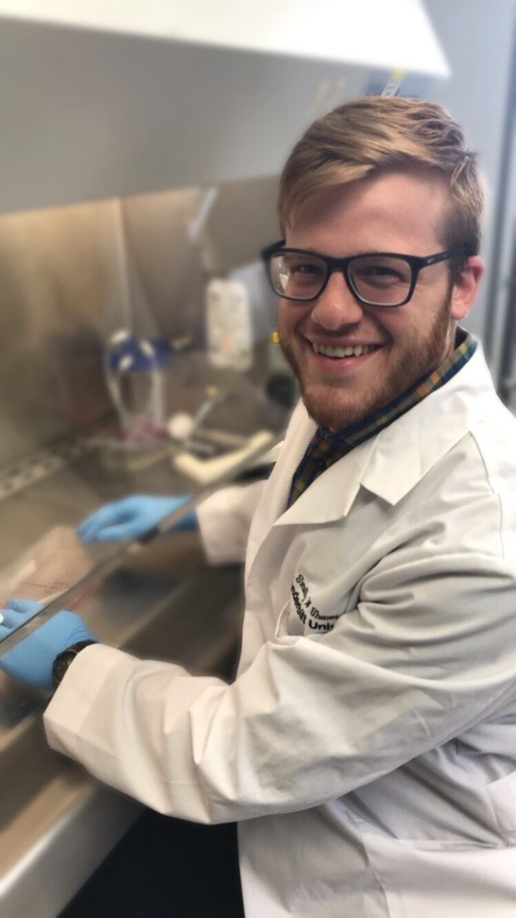 Tim smiling in a lab