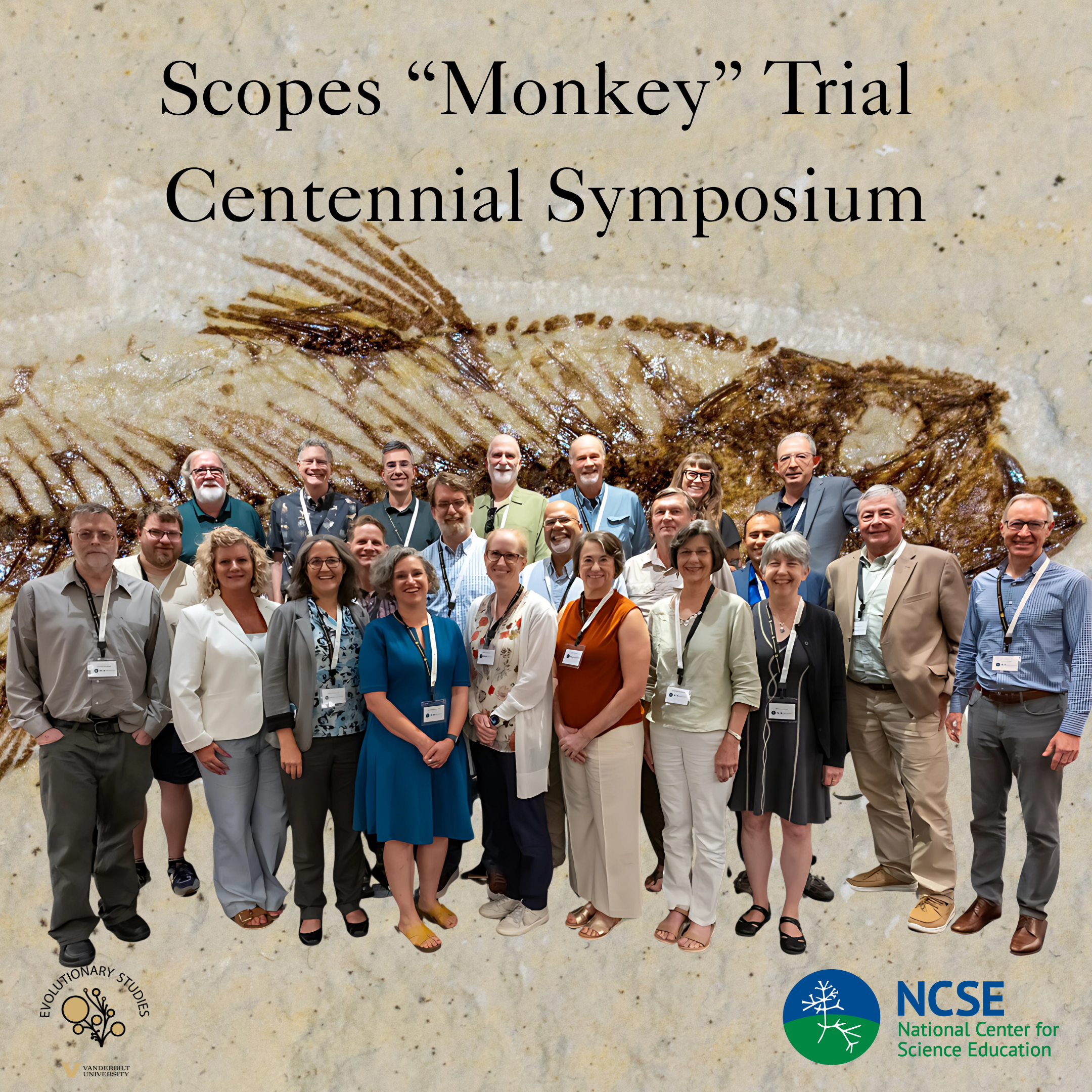 A group of 24 smiling people, mostly dressed in business casual attire, pose in front of a digitally added fossil fish background. The text above them reads, “Scopes ‘Monkey’ Trial Centennial Symposium.” The Evolutionary Studies Initiative logo is in the lower left corner, and the National Center for Science Education logo is in the lower right.
