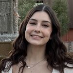 Layla smiling with long brown hair