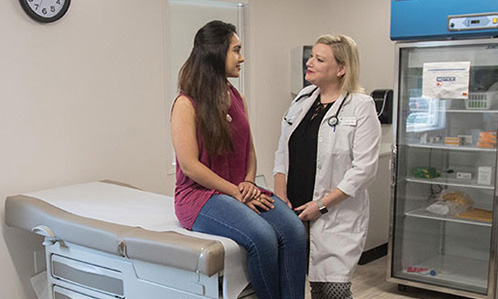 doctor and patient in health office