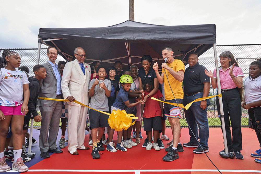 community members at ribbon-cutting of the new outdoor basketball court at Watkins Park in North Nashville