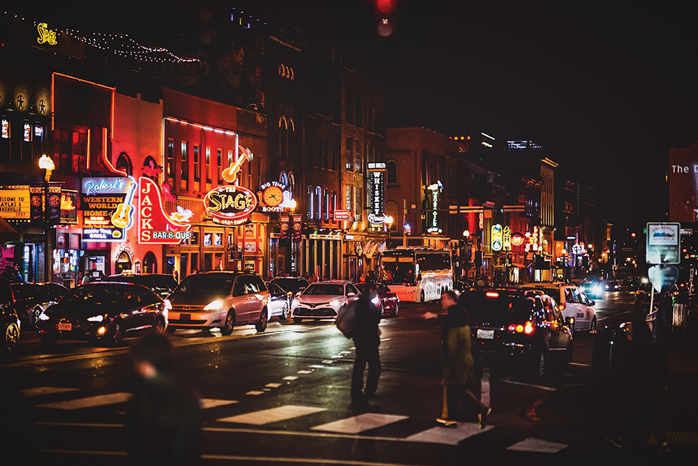 view of Broadway, downtown Nashville at night