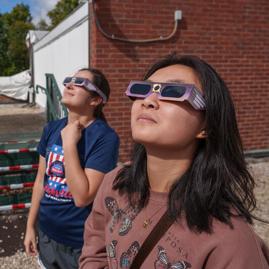 visitors at Dyer Observatory wearing eclipse viewing lasses
