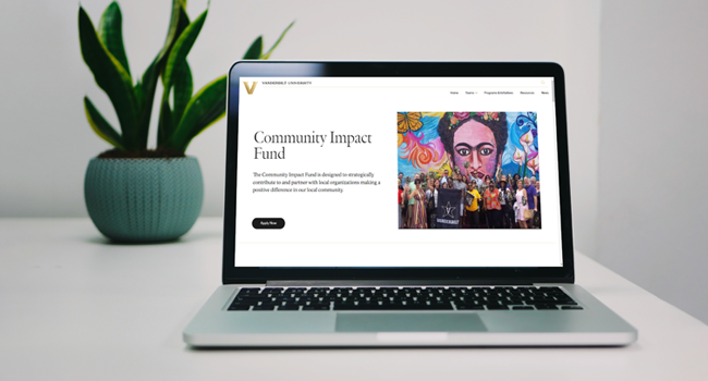 laptop computer displaying Vanderbilt's Community Impact Fund web page