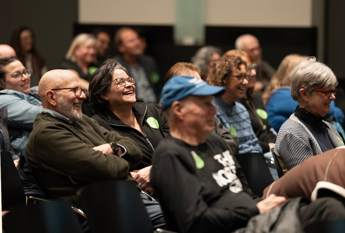 Audience members listen to a panel discussion at the Frist Art Museum