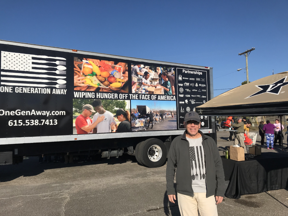 OneGenAway founder and director Chris Whitney at a food distribution event