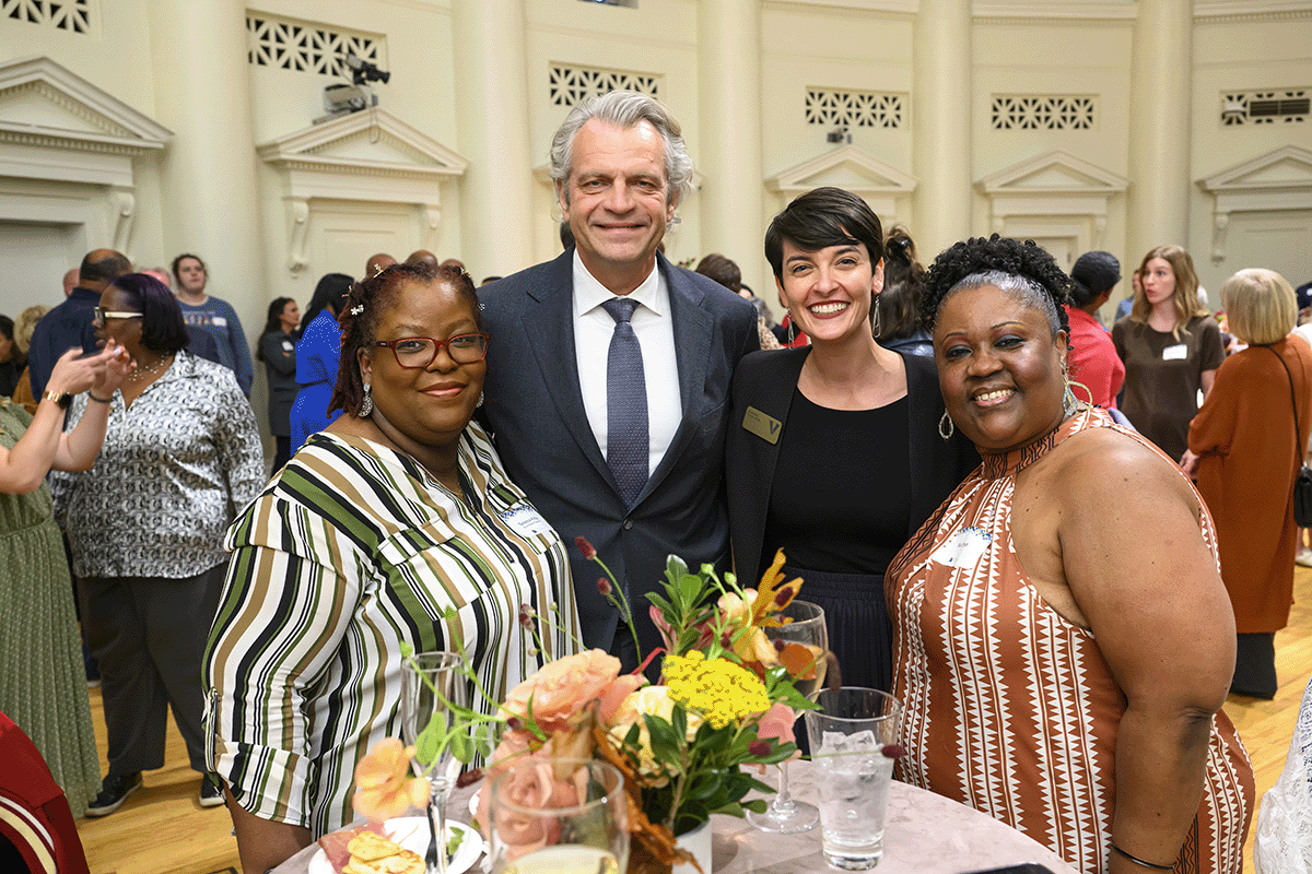 Blue Ribbon Award recipient Teneice Kirby, Chancellor Daniel Diermeier, Senior Director of Community Relations Kathleen Fuchs-Hritz, and guest Riki Shye at the Blue Ribbon Teacher Awards on Oct. 17, 2024. (Photo credit: John Amis)