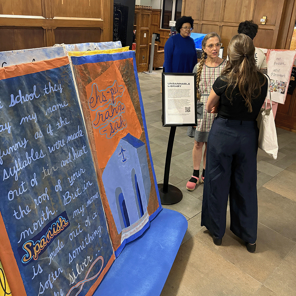 Community members view the Unbannable Library Interactive Exhibit on Oct. 24, 2024. (Jean and Alexander Heard Libraries)