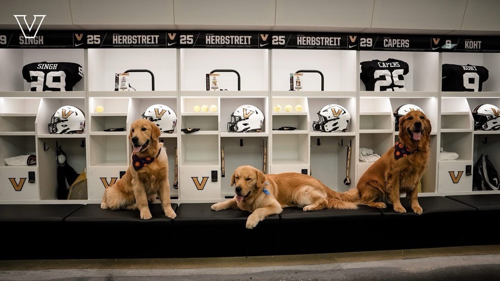 Pictured: Beau, Peter and Mitch Herbstreit in the locker room.