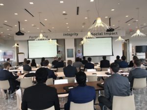 First-year MBA students listen to a presentation at BCG during the 2017 consulting trek
