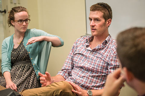 Students brainstorm programming ideas for the 2015-16 year. Grace Fletcher, who is pursuing master degrees in the graduate school and the School of Medicine, and Matt Inbusch, a second-year MBA student.