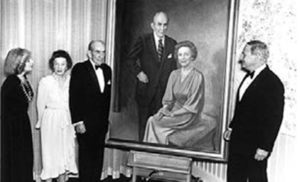 School benefactors Lulu and Ralph “Peck” Owen attend the unveiling of their portrait, which hangs in Management Hall. Their legacy of giving continues today through the family of their nephew, Charles Robb Swaney.