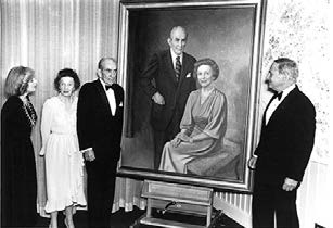School benefactors Lulu and Ralph “Peck” Owen attend the unveiling of their portrait, which hangs in Management Hall. Their legacy of giving continues today through the family of their nephew, Charles Robb Swaney.