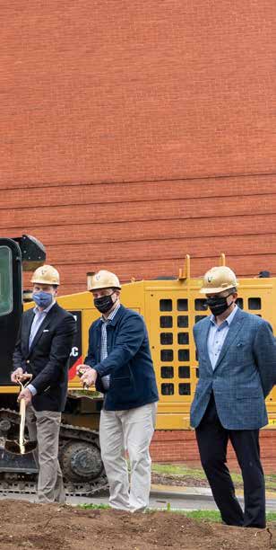 Chancellor Diermeier and Dean Johnson led the ceremonial shoveling of dirt at the April 8, 2021, groundbreaking event for the Management Hall expansion at the Owen Graduate School of Management.