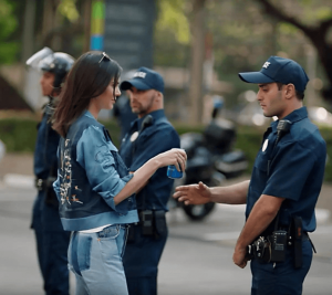 Kendall Jenner hands a police offer a Pepsi in the cringe 2017 ”Live for Now” advertisement campaign.