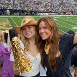 Olivia Moore with one of her friends at a football game.