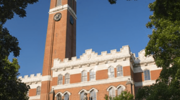 Vanderbilt's Kirkland Tower is pictured against a blue sky.