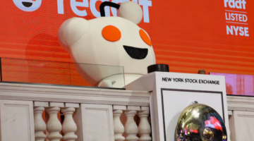 Pictured: Reddit mascot rings the opening bell, at the New York Stock Exchange (NYSE) in New York City, U.S., March 21, 2024. REUTERS/Brendan McDermid Purchase Licensing Rights