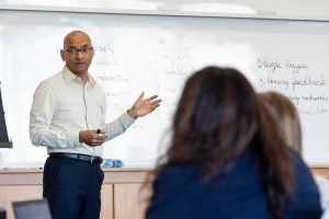 Pictured: Professor Rangaraj Ramanujam teaching a Vanderbilt Executive Education program in the classroom