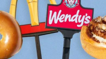 Pictured: Image from Getty. On a blue background, from left to right: a glazed donut with a bite taken out of it, the McDonalds sign, the Wendy's sign, and a cinnamon roll.
