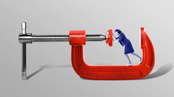Pictured: Image from Axios, A woman is pushing against a clamp that is screwed into place.