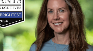 Pictured: Jennifer Luiz Lindsey in a headshot with the Poets & Quants banner.