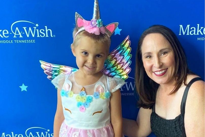 Pictured: Beth Torres poses with Make-A-Wish recipient