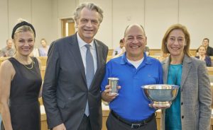 Pictured: Chancellor’s Cup presentation to Michael Lapre at the start of the Owen faculty and staff meeting. (Vanderbilt University)