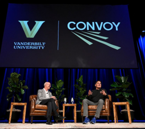 Pictured: Dean Tom Steenburgh, Vanderbilt Business is shown sitting with Mark Cuban at the Convoy Conference.