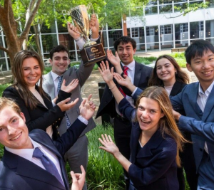 Pictured: Vanderbilt Business Accelerator Summer Business Immersion students from the 2025 program pose with the trophy